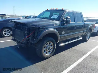 2015 Ford Super Duty F-250 SRW Lariat with VIN 1FT7W2BT1FED63208, listed as a IAAI auction lot 41785728 with 165,282 mi miles. Bid and sale history available at carsss.com. Image 2.