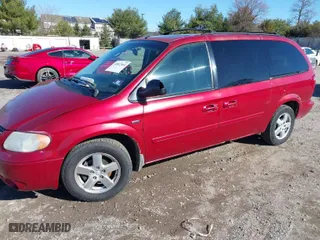 2007 Dodge Grand Caravan SXT with VIN 2D4GP44L77R205470, listed as a IAAI auction lot 41812914 with 153,383 mi miles. Bid and sale history available at carsss.com. Image 2.