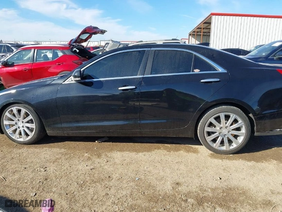 2015 Cadillac ATS Luxury with VIN 1G6AB5S39F0132415, listed as a IAAI auction lot 41348641 with 144,447 mi miles. Bid and sale history available at carsss.com. Image 14.