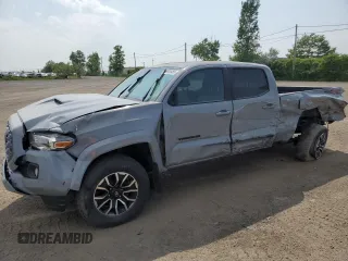 2021 Toyota Tacoma SR5 with VIN 5TFDZ5BN5MX056865, listed as a Copart auction lot 59925465 with 23,044 mi miles and Salvage title. Bid and sale history available at DreamBid. Image 1.