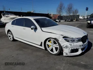 2018 BMW 7 Series 750i with VIN WBA7F0C53JGM23021, listed as a Copart auction lot 38758303 with 0 mi miles. Bid and sale history available at carsss.com. Image 4.