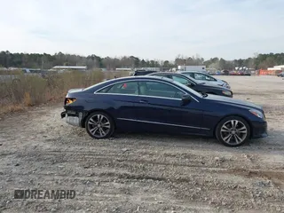 2015 Mercedes-Benz E-Class E 400 with VIN WDDKJ6FB4FF307393, listed as a IAAI auction lot 41775634 with 100,928 mi miles. Bid and sale history available at carsss.com. Image 13.