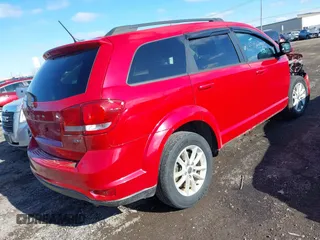 2017 Dodge Journey SXT z VIN 3C4PDDBG1HT577753, wystawiony jako IAAI lot #41855579 z przebiegiem 123 185 mil mil oraz . Historia ofert i sprzedaży dostępna na DreamBid. Obrazek 4.