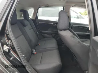 2015 Honda Fit EX-L z VIN 3HGGK5H89FM701322, wystawiony jako Copart lot #56565885 z przebiegiem 195 154 mil mil oraz Szkoda całkowita • Salvage title. Historia ofert i sprzedaży dostępna na DreamBid. Obrazek 10.