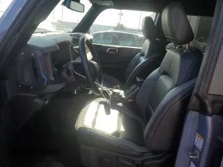 2024 Ford Bronco with VIN 1FMEE1BP7RLA20924, listed as a Copart auction lot 69381544 with 8,042 mi miles and Salvage title. Bid and sale history available at DreamBid. Image 7.