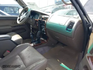 2000 Toyota 4Runner Limited with VIN JT3HN87R0Y0277545, listed as a IAAI auction lot 41880307 with 223,833 mi miles. Bid and sale history available at carsss.com. Image 5.