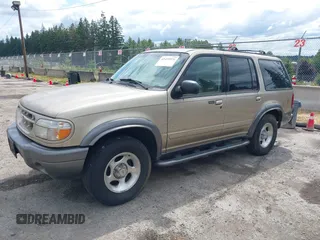 2001 Ford Explorer XLT z VIN 1FMZU73E71ZA79770, wystawiony jako IAAI lot #42499921 z przebiegiem 174 050 mil mil oraz . Historia ofert i sprzedaży dostępna na DreamBid. Obrazek 2.
