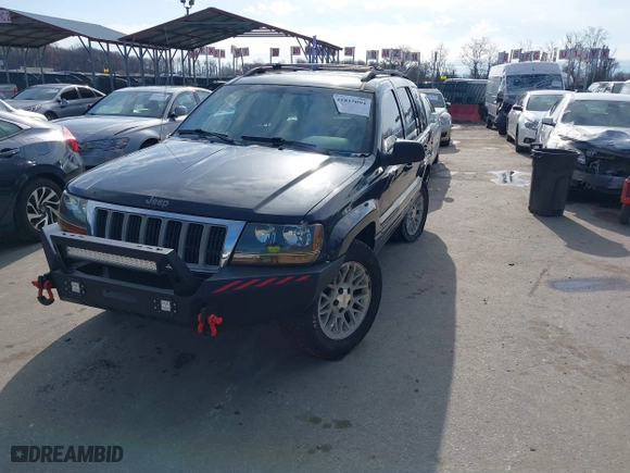 2004 Jeep Grand Cherokee Limited with VIN 1J4GW58N74C120435, listed as a IAAI auction lot 41815094 with 193,056 mi miles. Bid and sale history available at carsss.com. Image 2.