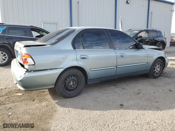 2000 Honda Civic VP with VIN 2HGEJ6617YH545899, listed as a Copart auction lot 86648614 with 212,551 mi miles and Salvage Title. Bid and sale history available at carsss.com. Image 3.