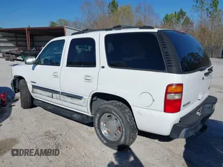 2003 GMC Yukon SLT with VIN 1GKEC13Z83R143232, listed as a IAAI auction lot 41655509 with 148,574 mi miles. Bid and sale history available at carsss.com. Image 3.