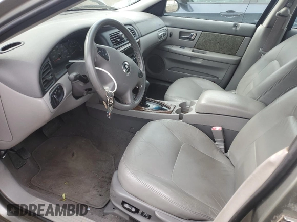 2002 Mercury Sable LS z VIN 1MEHM55S22G652254, wystawiony jako Copart lot #58667475 z przebiegiem 68 050 mil mil oraz Czysty tytuł • Clean title. Historia ofert i sprzedaży dostępna na DreamBid. Obrazek 7.
