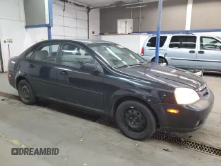 2008 Suzuki Forenza z VIN KL5JD56Z48K957359, wystawiony jako Copart lot #79184084 z przebiegiem 142 632 mil mil oraz Tytuł czysty. Historia ofert i sprzedaży dostępna na DreamBid. Obrazek 4.
