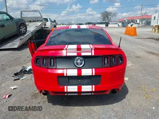 2014 Ford Mustang V6 with VIN 1ZVBP8AMXE5223660, listed as a IAAI auction lot 42009379 with 83,329 mi miles. Bid and sale history available at carsss.com. Image 16.