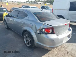 2013 Dodge Avenger SE with VIN 1C3CDZAB6DN679811, listed as a IAAI auction lot 41671107 with 236,483 mi miles and . Bid and sale history available at carsss.com. Image 3.