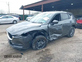2021 Mazda CX-5 Touring with VIN JM3KFBCM8M0492145, listed as a IAAI auction lot 39077248 with 20,408 mi miles. Bid and sale history available at carsss.com. Image 18.