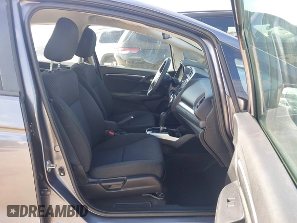 2020 Honda Fit LX with VIN 3HGGK5H46LM725764, listed as a IAAI auction lot 42499144 with 79,758 mi miles and . Bid and sale history available at DreamBid. Image 5.