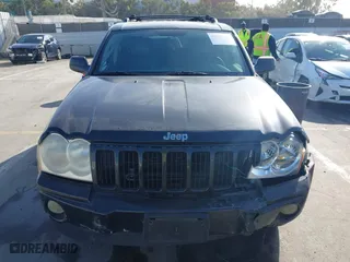 2005 Jeep Grand Cherokee Laredo with VIN 1J8GS48K95C615330, listed as a IAAI auction lot 41719101 with 152,186 mi miles. Bid and sale history available at carsss.com. Image 12.