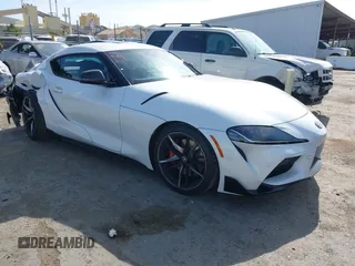 2021 Toyota Supra 3.0 z VIN WZ1DB0C06MW039185, wystawiony jako IAAI lot #42160847 z przebiegiem 42 736 mil mil oraz . Historia ofert i sprzedaży dostępna na DreamBid. Obrazek 1.