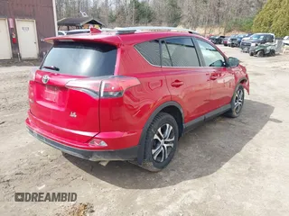 2016 Toyota RAV4 LE with VIN 2T3BFREV7GW517043, listed as a IAAI auction lot 41828999 with 103,587 mi miles. Bid and sale history available at carsss.com. Image 4.