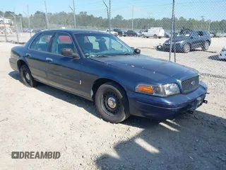 1999 Ford Crown Victoria Police z VIN 2FAFP71W0XX183970, wystawiony jako IAAI lot #42155122 z przebiegiem 248 807 mil mil oraz . Historia ofert i sprzedaży dostępna na DreamBid. Obrazek 1.