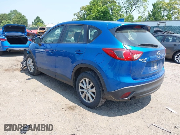 2014 Mazda CX-5 Sport z VIN JM3KE4BE4E0367444, wystawiony jako IAAI lot #42431272 z przebiegiem 181 191 mil mil oraz . Historia ofert i sprzedaży dostępna na DreamBid. Obrazek 3.