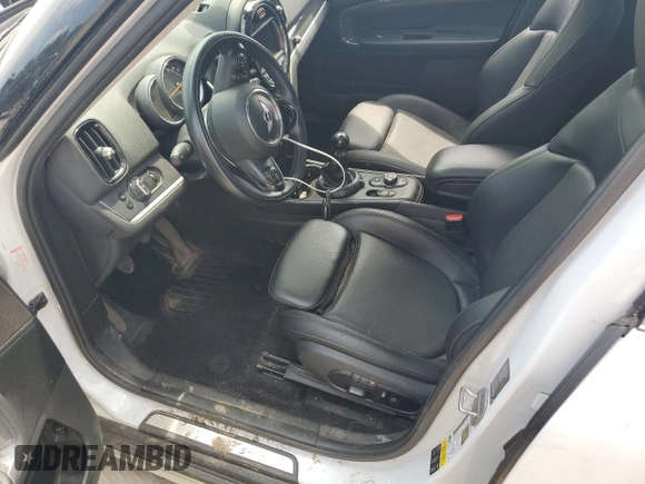 2017 MINI Countryman Cooper S z VIN WMZYT5C39H3E18776, wystawiony jako Copart lot #60456515 z przebiegiem 126 808 mil mil oraz Szkoda całkowita • Salvage title. Historia ofert i sprzedaży dostępna na DreamBid. Obrazek 7.