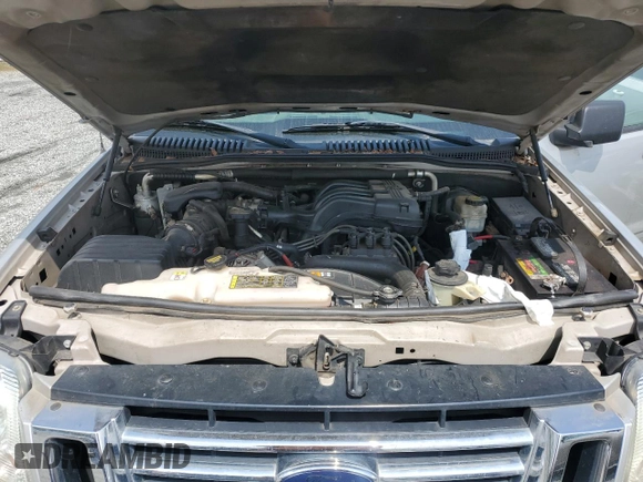 2009 Ford Explorer Sport Trac XLT с VIN 1FMEU31E79UA43130, выставлен на аукционе Copart как лот 51657735 с пробегом 230 227 миль миль и Списание • Salvage title. История ставок и продаж доступна на DreamBid. Изображение 11.