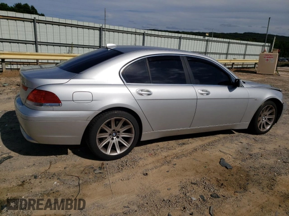 2003 BMW 7 Series 745i with VIN WBAGL63473DP68267, listed as a Copart auction lot 69923064 with 100,468 mi miles and Salvage title. Bid and sale history available at DreamBid. Image 3.