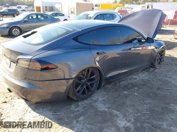 2022 Tesla Model S with VIN 5YJSA1E54NF488443, listed as a IAAI auction lot 41289281 with Not Provided miles and . Bid and sale history available at DreamBid. Image 4.