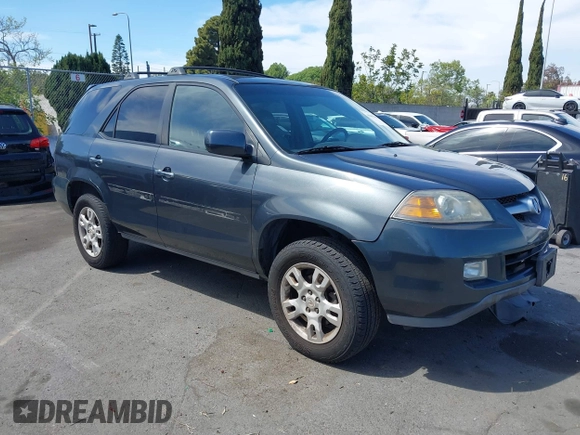 2004 Acura MDX Touring Pkg w/Navigation with VIN 2HNYD18834H517618, listed as a IAAI auction lot 42003807 with 186,555 mi miles. Bid and sale history available at carsss.com. Image 1.
