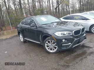 2015 BMW X6 xDrive35i with VIN 5UXKU2C53F0N76799, listed as a IAAI auction lot 41946628 with 173,607 mi miles. Bid and sale history available at carsss.com. Image 1.