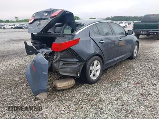 2015 Kia Optima LX z VIN KNAGM4A78F5588728, wystawiony jako IAAI lot #42116653 z przebiegiem 203 145 mil mil oraz . Historia ofert i sprzedaży dostępna na DreamBid. Obrazek 4.