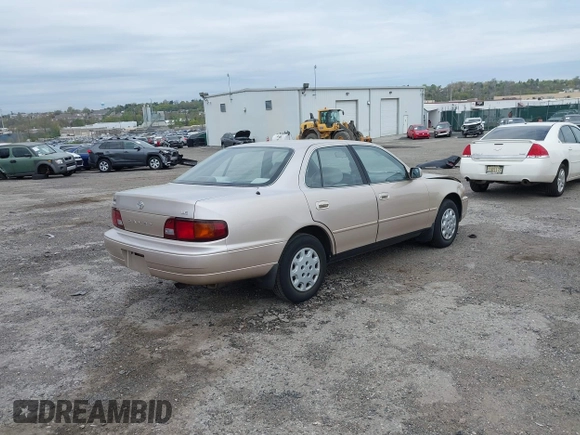 1996 Toyota Camry DX with VIN 4T1BG12K7TU813773, listed as a IAAI auction lot 42084977 with 49,453 mi miles. Bid and sale history available at carsss.com. Image 4.