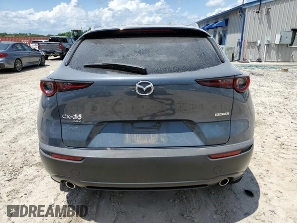 2022 Mazda CX-30 S Carbon Edition с VIN 3MVDMBCL0NM434395, выставлен на аукционе Copart как лот 56247715 с пробегом 40 698 миль миль и На запчасти • Non repairable. История ставок и продаж доступна на DreamBid. Изображение 6.