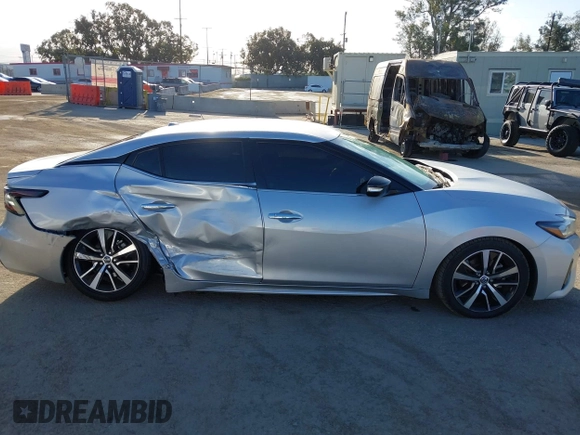 2021 Nissan Maxima SV with VIN 1N4AA6CV7MC512294, listed as a IAAI auction lot 42243607 with 87,803 mi miles and . Bid and sale history available at DreamBid. Image 13.