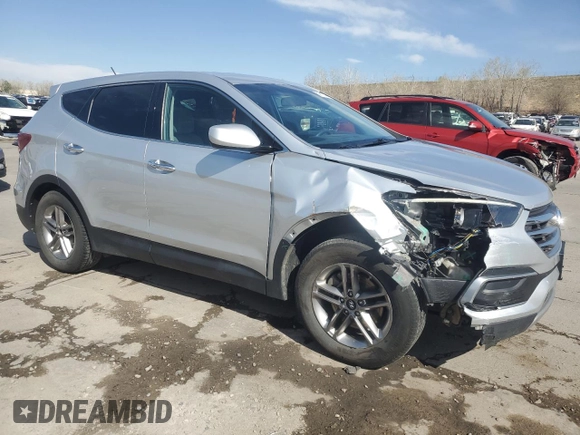 2018 Hyundai Santa Fe 2.4L z VIN 5XYZTDLB7JG572441, wystawiony jako Copart lot #52810145 z przebiegiem 106 578 mil mil oraz Szkoda całkowita • Salvage title. Historia ofert i sprzedaży dostępna na DreamBid. Obrazek 4.