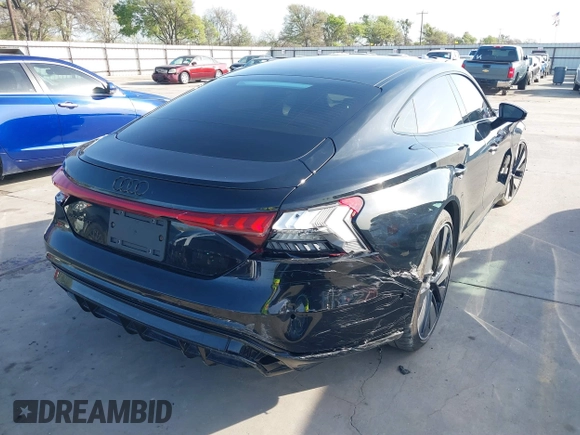 2024 Audi e-tron GT Prestige z VIN WAUEJBFW6R7002606, wystawiony jako IAAI lot #41797047 z przebiegiem 6 184 mil mil oraz . Historia ofert i sprzedaży dostępna na DreamBid. Obrazek 4.