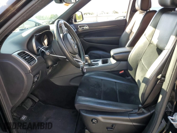 2018 Jeep Grand Cherokee Laredo E with VIN 1C4RJEAGXJC246874, listed as a Copart auction lot 56722005 with 101,493 mi miles and Salvage title. Bid and sale history available at DreamBid. Image 7.