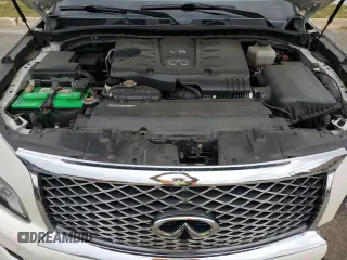 2016 Infiniti QX80 with VIN JN8AZ2NCXG9401865, listed as a Copart auction lot 70574004 with 111,335 mi miles and Salvage Title. Bid and sale history available at DreamBid. Image 12.