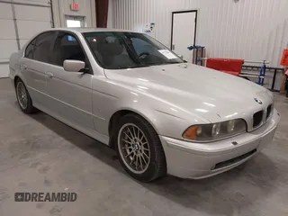 2001 BMW 5 Series 530iA with VIN WBADT63451CF02464, listed as a IAAI auction lot 41753041 with 297,760 mi miles. Bid and sale history available at carsss.com. Image 1.