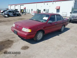 1993 Ford Tempo GL z VIN 2FAPP36X1PB133882, wystawiony jako IAAI lot #41719972 z przebiegiem 61 118 mil mil oraz . Historia ofert i sprzedaży dostępna na DreamBid. Obrazek 2.