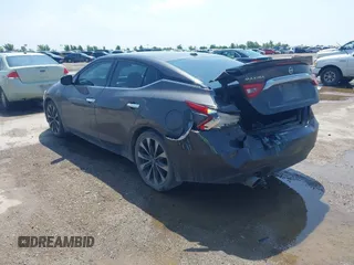 2016 Nissan Maxima SR z VIN 1N4AA6AP0GC400686, wystawiony jako IAAI lot #42378284 z przebiegiem 139 996 mil mil oraz . Historia ofert i sprzedaży dostępna na DreamBid. Obrazek 3.
