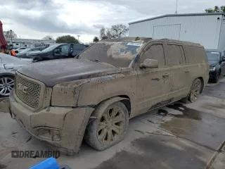 2015 GMC Yukon XL Denali with VIN 1GKS2JKJXFR195063, listed as a Copart auction lot 48877355 with 0 mi miles and Salvage Title. Bid and sale history available at carsss.com. Image 1.