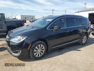2019 Chrysler Pacifica Touring L with VIN 2C4RC1BG1KR583136, listed as a Copart auction lot 64259675 with 142,823 mi miles and Clean title. Bid and sale history available at DreamBid. Image 1.