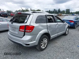 2013 Dodge Journey SXT with VIN 3C4PDDBG1DT507356, listed as a IAAI auction lot 42592501 with 128,094 mi miles and . Bid and sale history available at DreamBid. Image 4.