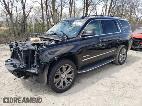 2015 GMC Yukon Denali with VIN 1GKS2CKJXFR702247, listed as a Copart auction lot 51648175 with 151,936 mi miles and Salvage Title. Bid and sale history available at carsss.com. Image 1.