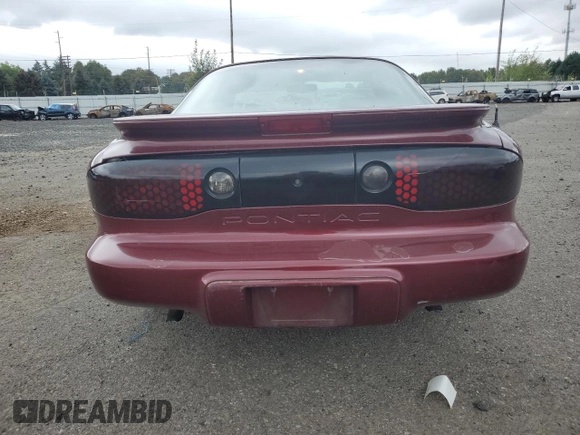 2000 Pontiac Firebird Firebird z VIN 2G2FS22K6Y2143127, wystawiony jako Copart lot #72041384 z przebiegiem 181 787 mil mil oraz Szkoda całkowita • Salvage title. Historia ofert i sprzedaży dostępna na DreamBid. Obrazek 6.