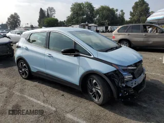 2023 Chevrolet Bolt EV 2LT with VIN 1G1FX6S04P4122510, listed as a Copart auction lot 60584705 with 12,291 mi miles and Salvage title. Bid and sale history available at DreamBid. Image 4.