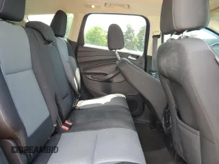 2017 Ford Escape SE z VIN 1FMCU0GD5HUA47616, wystawiony jako Copart lot #57180915 z przebiegiem 193 358 mil mil oraz Czysty tytuł • Clean title. Historia ofert i sprzedaży dostępna na DreamBid. Obrazek 11.