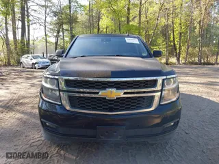 2015 Chevrolet Suburban LT with VIN 1GNSKJKC0FR238524, listed as a IAAI auction lot 42046889 with 179,676 mi miles. Bid and sale history available at carsss.com. Image 12.